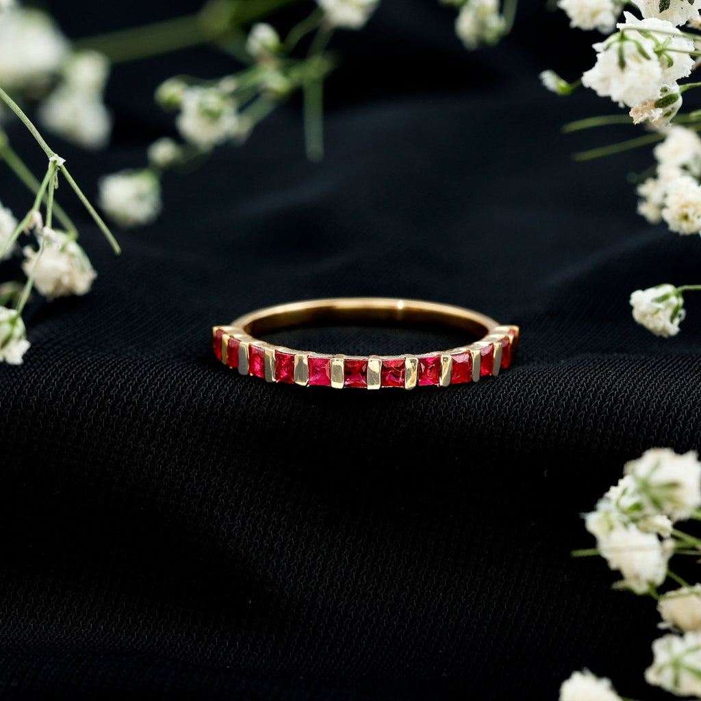 Princess Cut Ruby Semi Eternity Ring in Bar Setting