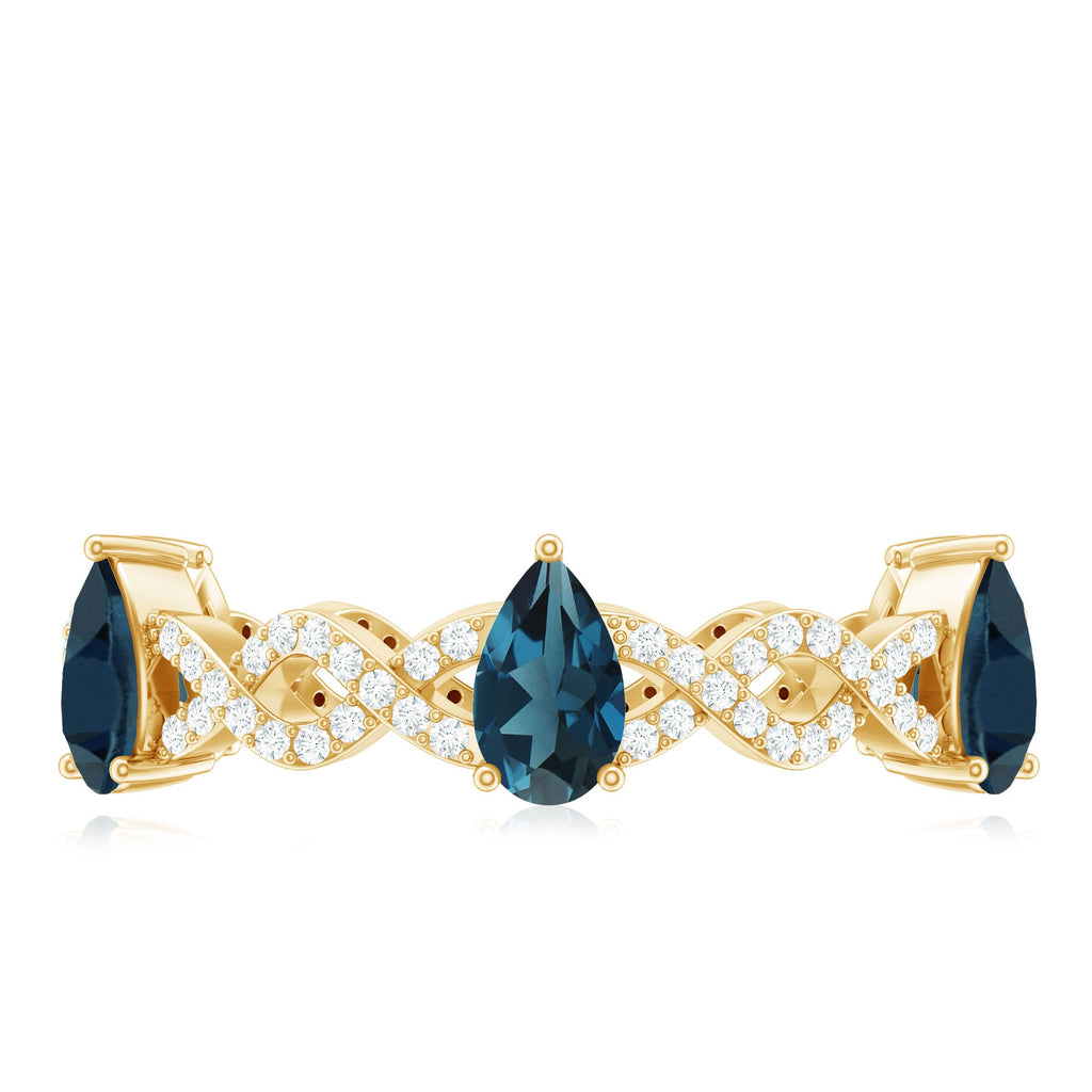 Pear Shape London Blue Topaz Crossover Eternity Band with Diamond