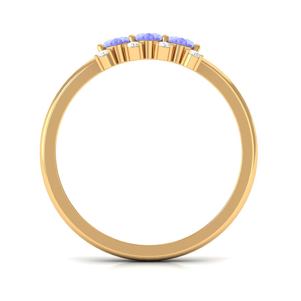 Oval Cut Tanzanite Three Stone Ring with Diamond
