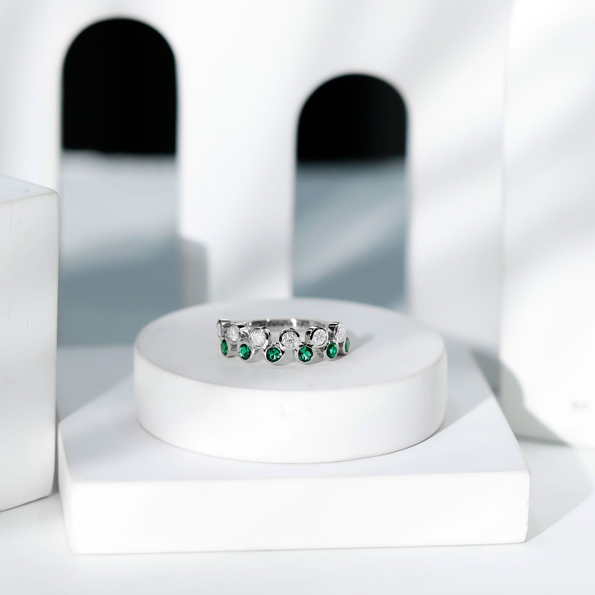Simple Bezel Set Round Created Emerald and Moissanite Half Eternity Ring