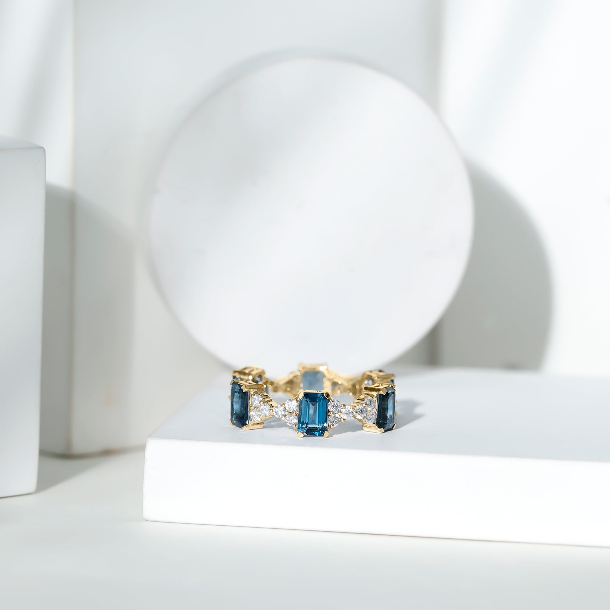 4X6mm Emerald Cut London Blue Topaz Designer Eternity Ring with Moissanite