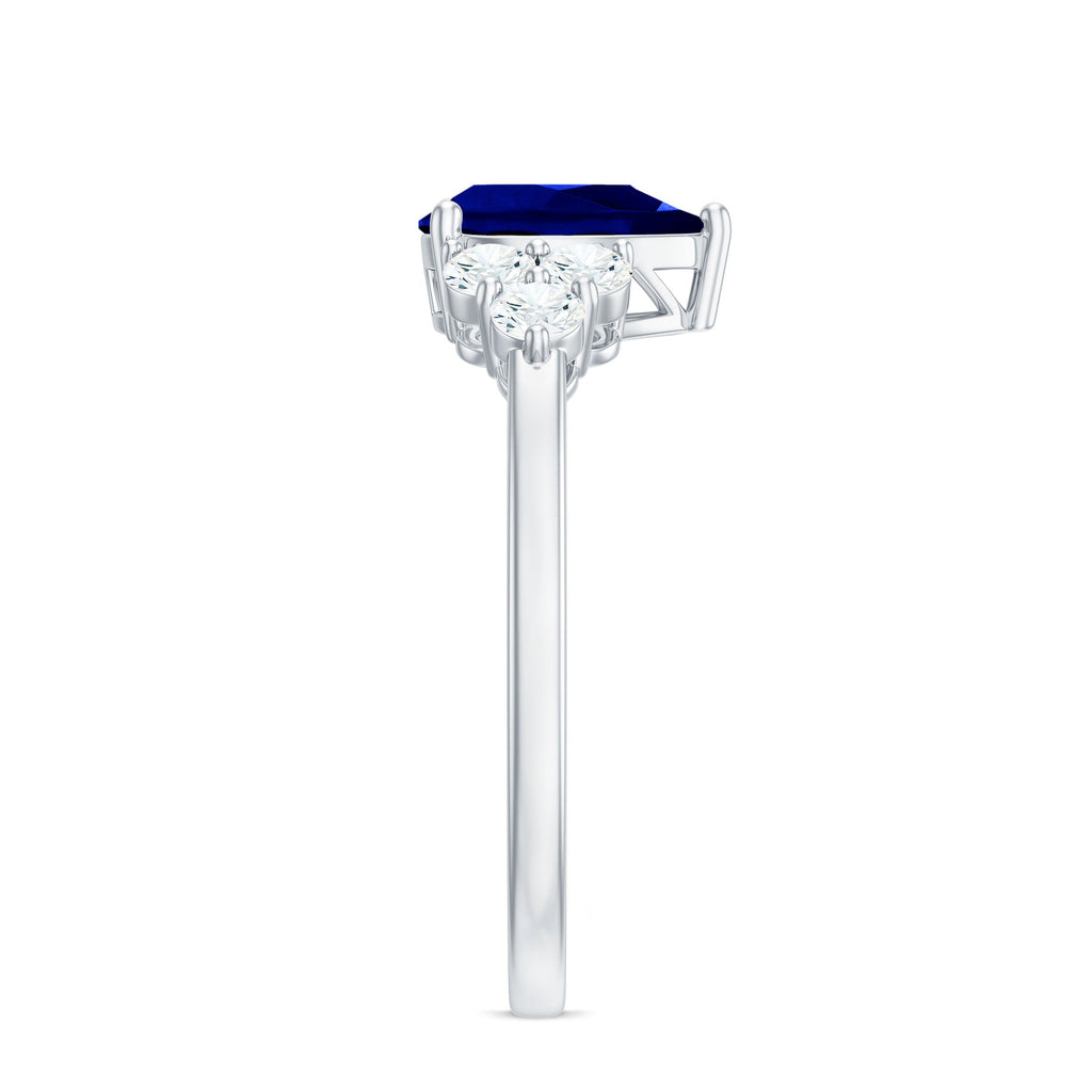 Certified 1.6 Carat Lab Grown Blue Sapphire Pear Engagement Ring with Diamond Trio