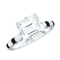 Claw Set Moissanite Engagement Ring With Black Diamond