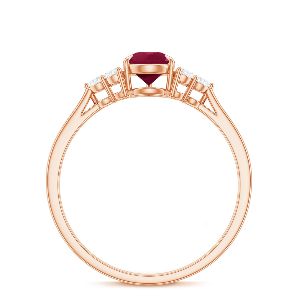 Claw Set Pear Cut Ruby Engagement Ring with Diamond Trio