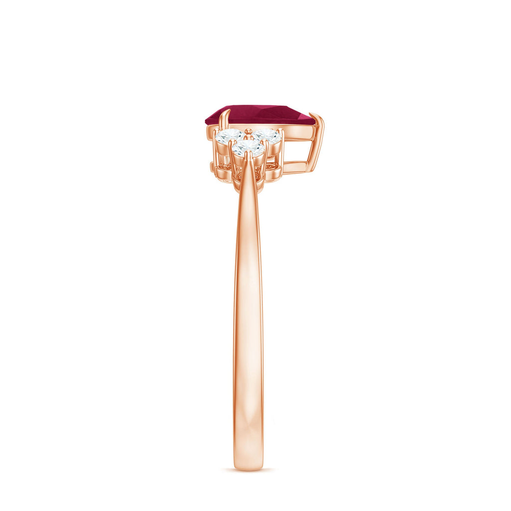 Claw Set Pear Cut Ruby Engagement Ring with Diamond Trio