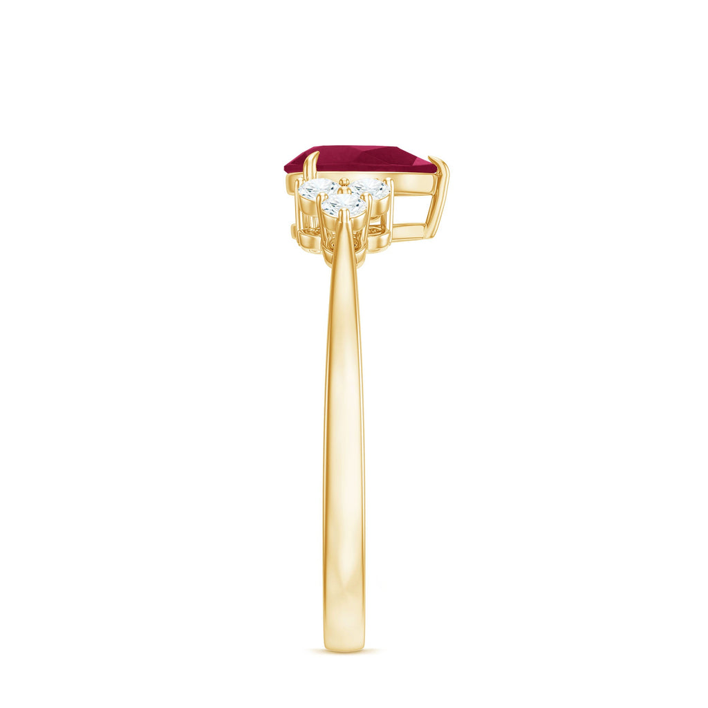 Claw Set Pear Cut Ruby Engagement Ring with Diamond Trio