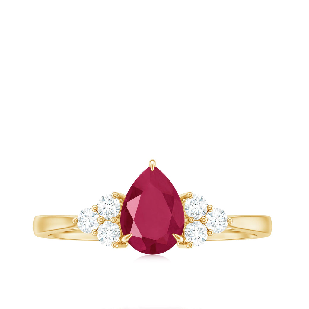Claw Set Pear Cut Ruby Engagement Ring with Diamond Trio