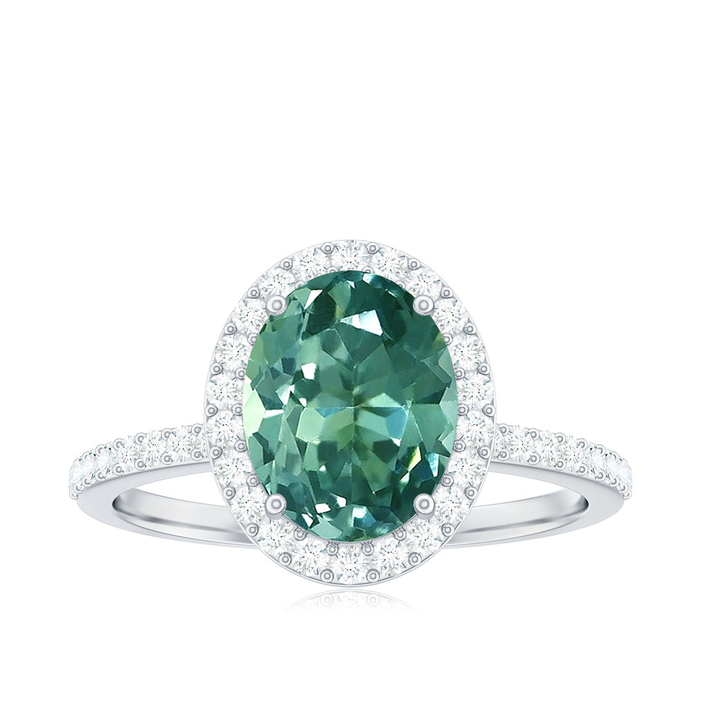 Oval Cut Created Green Sapphire and Diamond Halo Ring