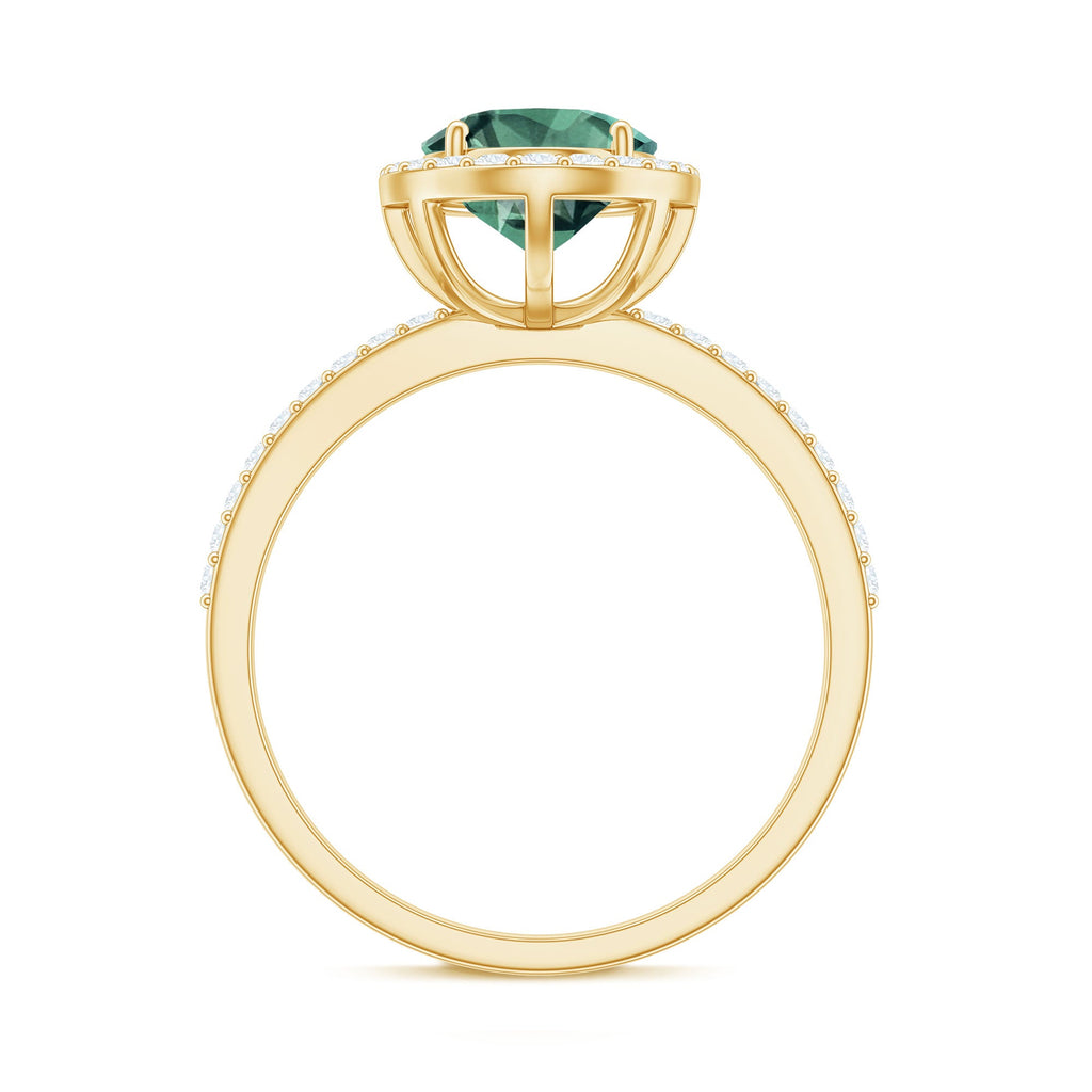 Oval Cut Created Green Sapphire and Diamond Halo Ring