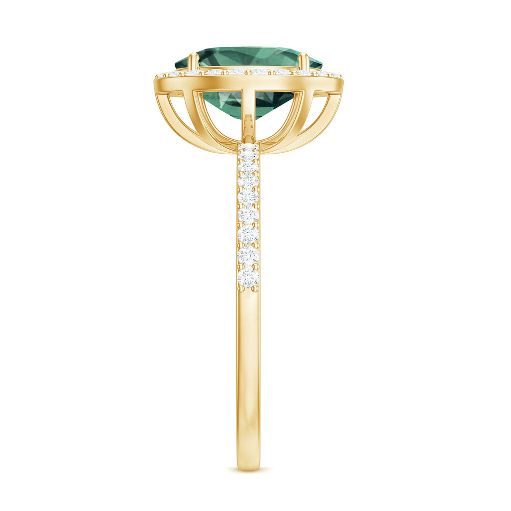 Oval Cut Created Green Sapphire and Diamond Halo Ring