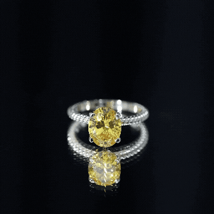 Oval Created Yellow Sapphire Solitaire Ring with Surprise Diamond