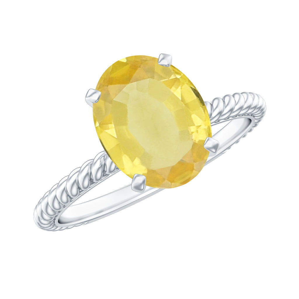 Oval Created Yellow Sapphire Solitaire Ring with Surprise Diamond