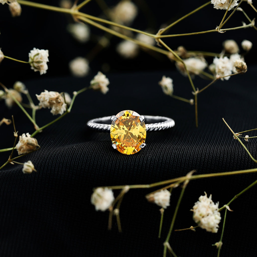 Oval Created Yellow Sapphire Solitaire Ring with Surprise Diamond