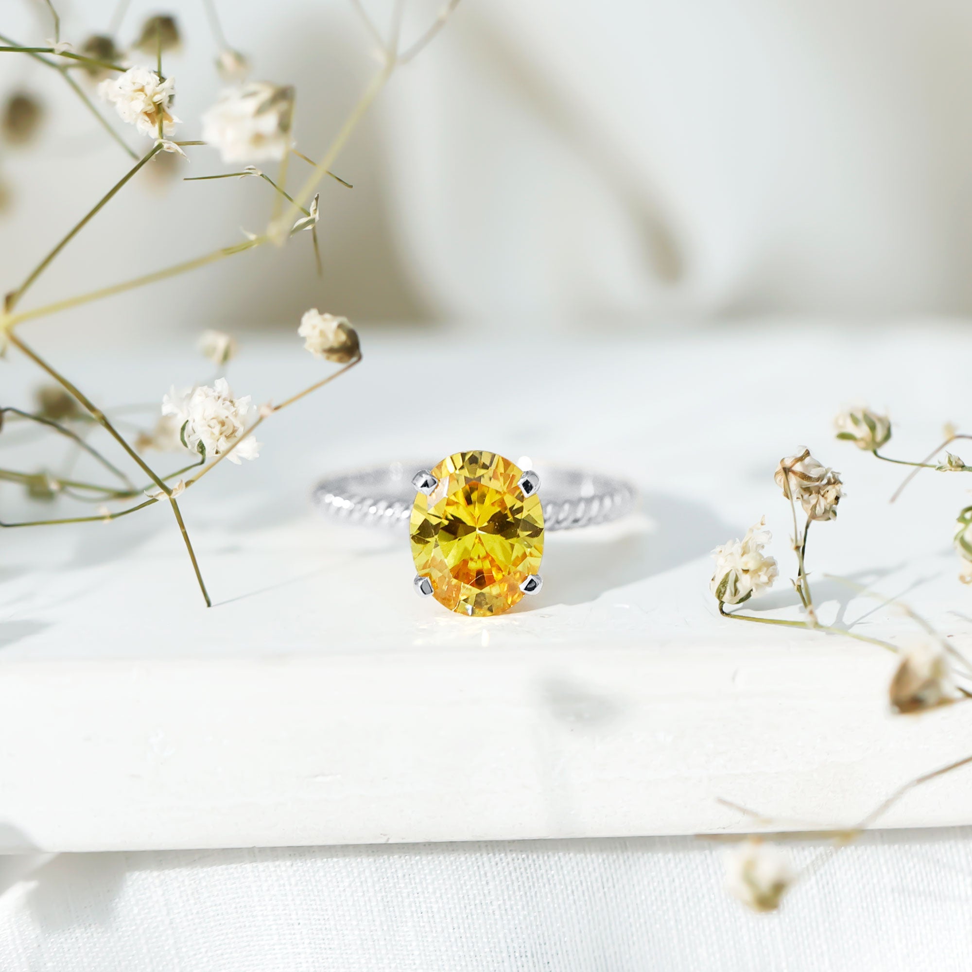 Oval Created Yellow Sapphire Solitaire Ring with Surprise Diamond