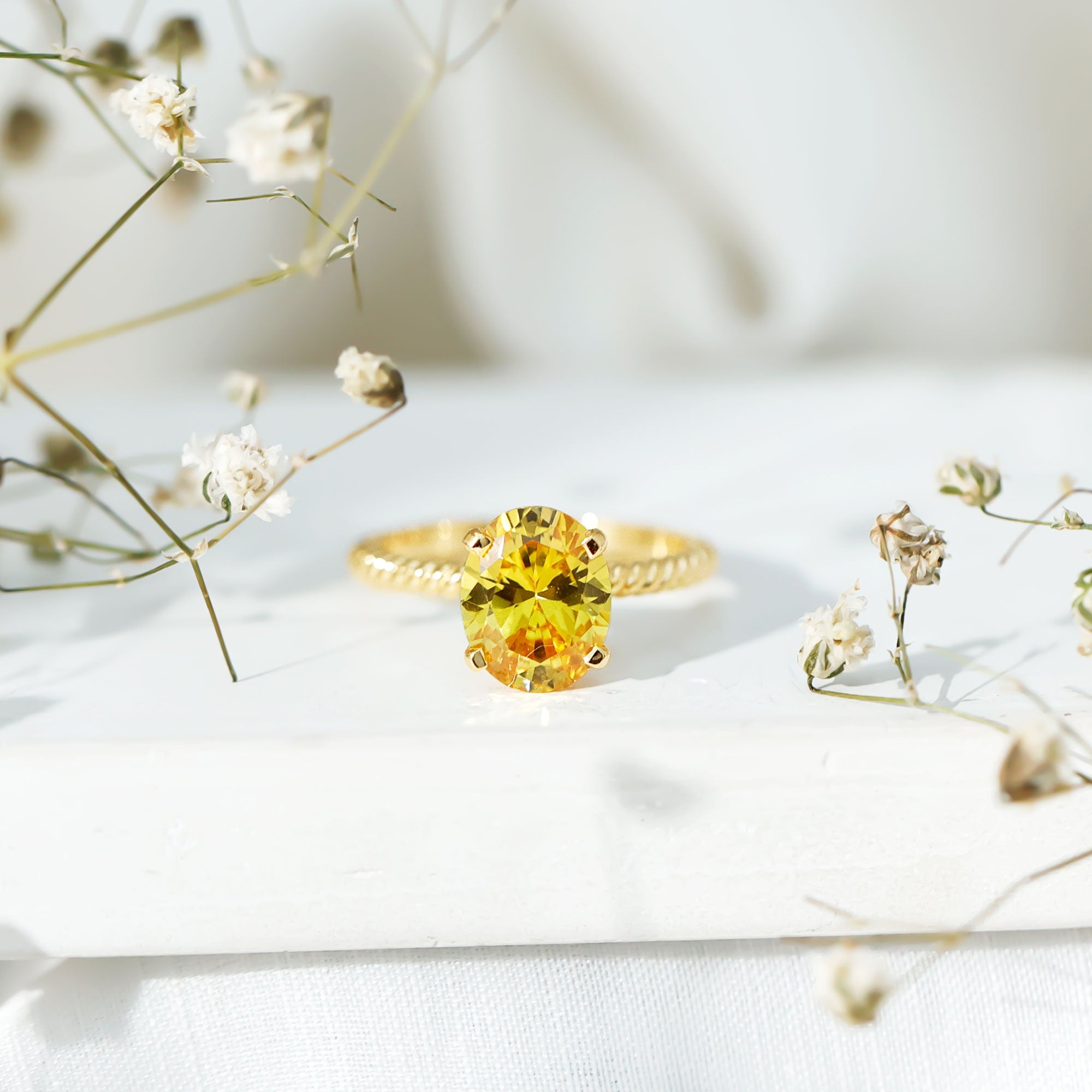 Oval Created Yellow Sapphire Solitaire Ring with Surprise Diamond