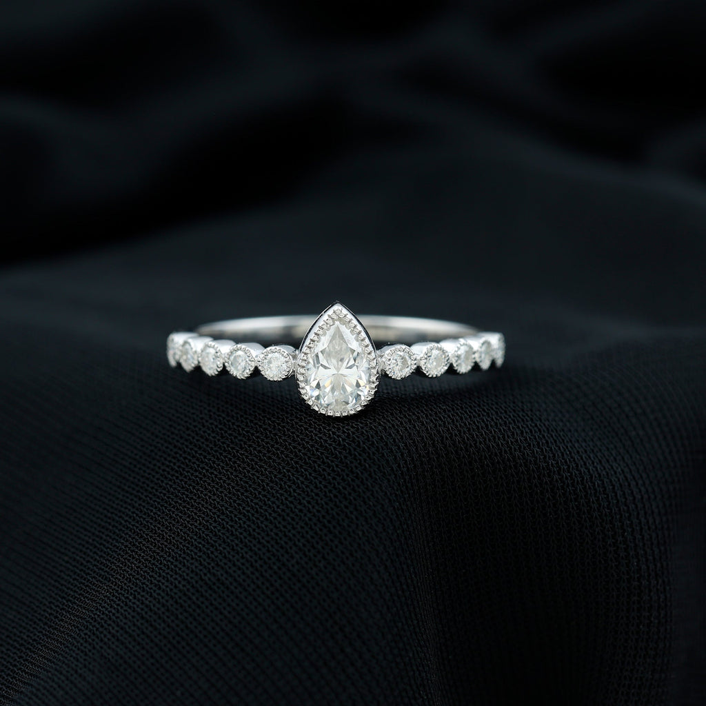 Lab Grown Diamond 5X7 MM Pear Shaped Engagement Ring With Side Stones