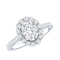 Lab Grown Diamond 6X8MM Oval Halo Engagement Ring With Side Stones