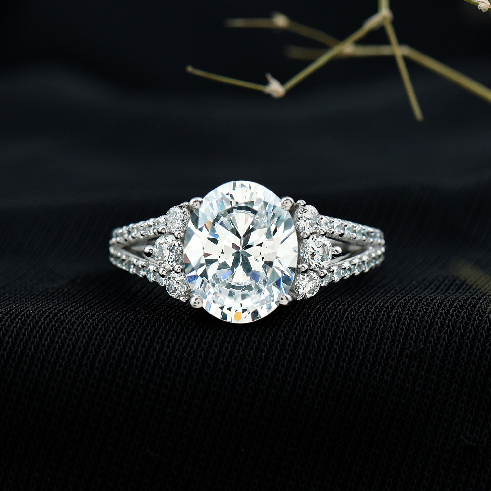 Solitaire Cubic Zirconia Oval Engagement Ring with Side Stones