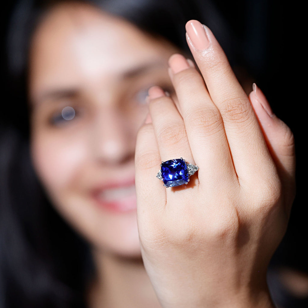 Certified 9 Carat Lab Grown Blue Sapphire Cushion Cut Engagement Ring with Diamond Trio