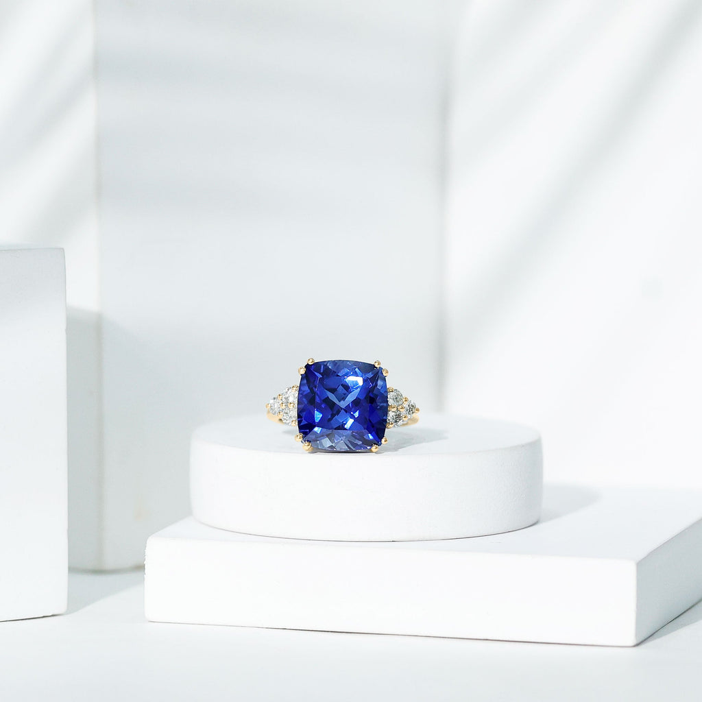 Certified 9 Carat Lab Grown Blue Sapphire Cushion Cut Engagement Ring with Diamond Trio
