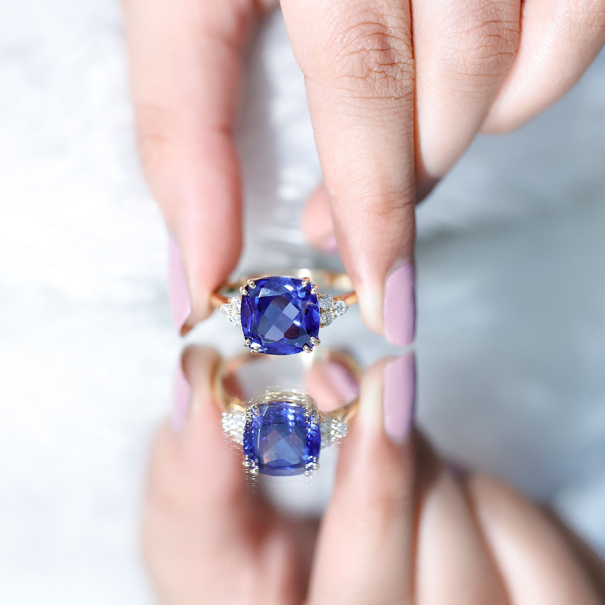 Certified 9 Carat Lab Grown Blue Sapphire Cushion Cut Engagement Ring with Diamond Trio