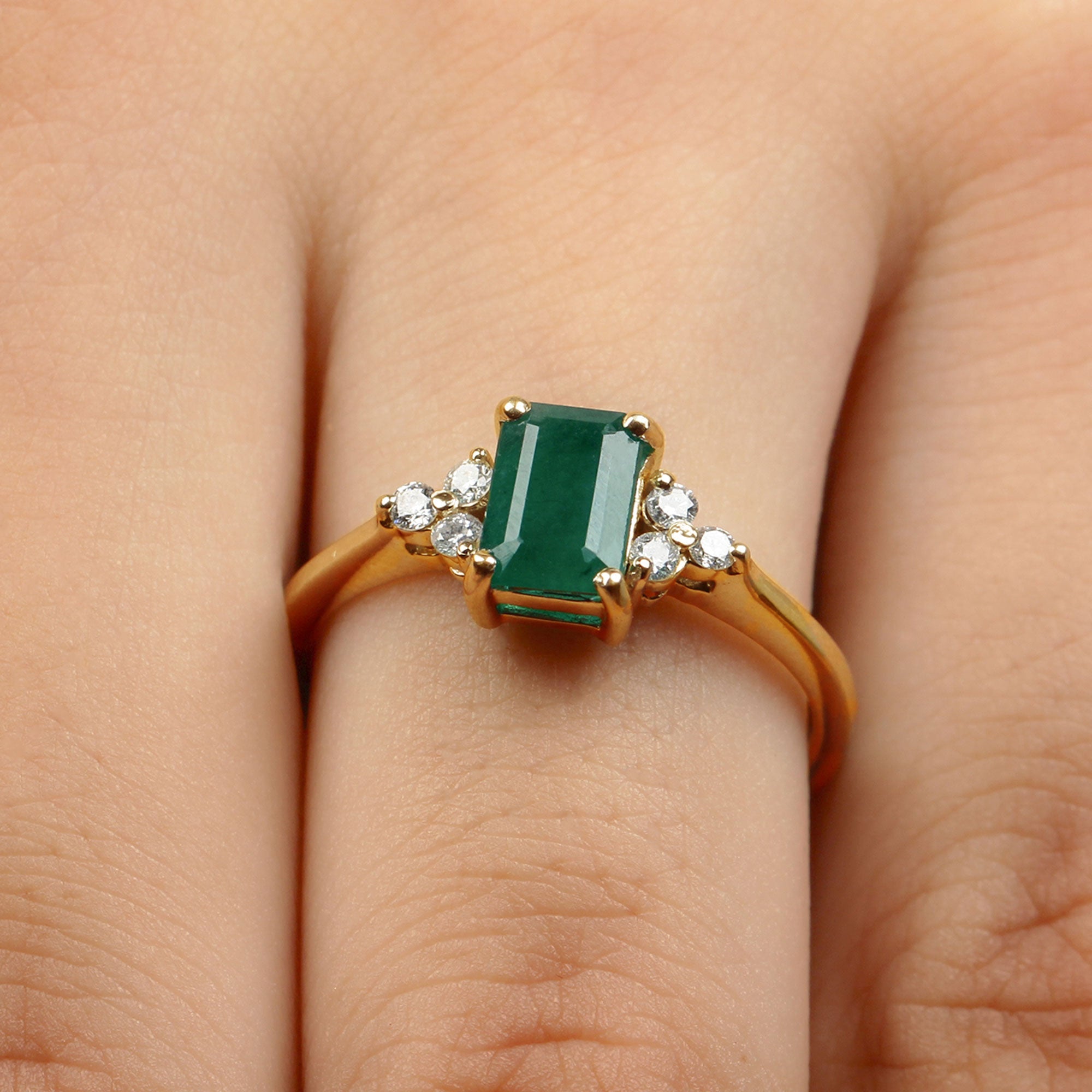 Octagon Cut Emerald Engagement Ring with Diamond Trio