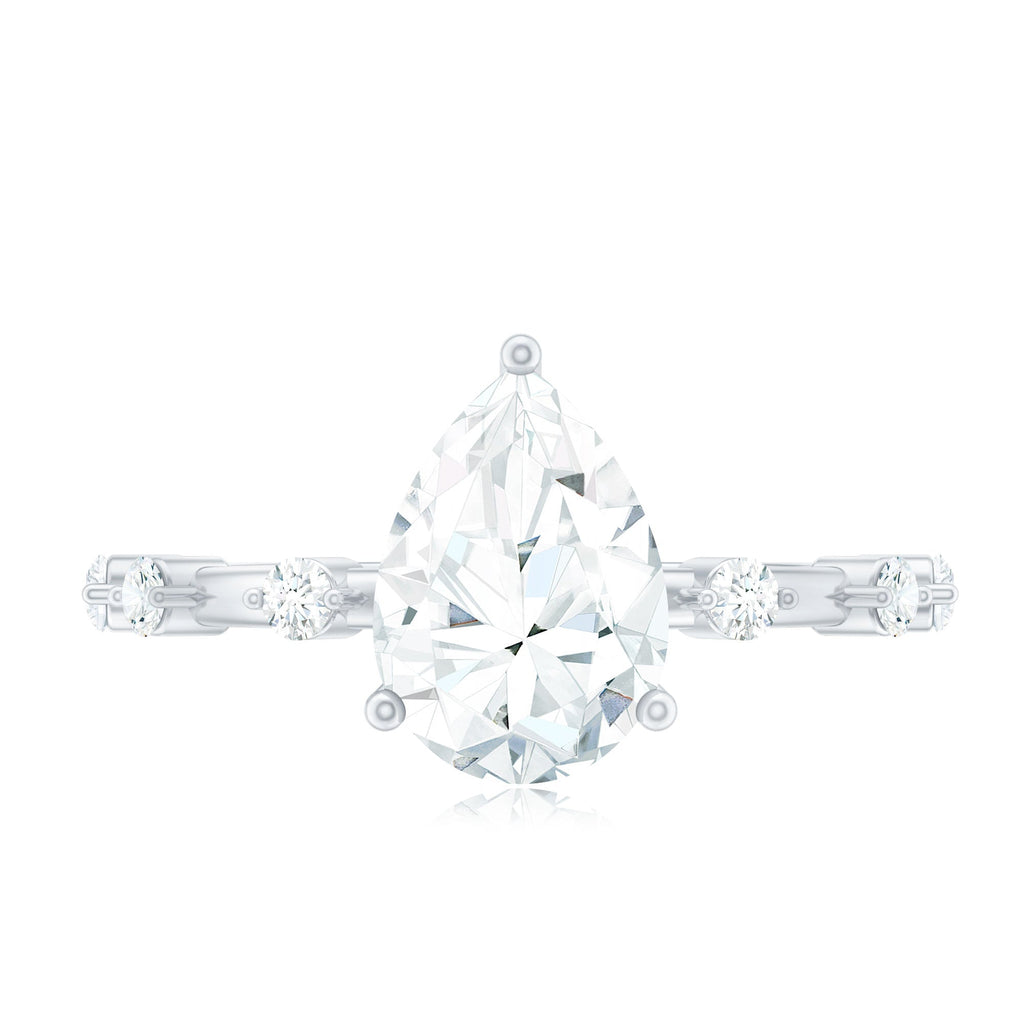 Pear Shaped Moissanite Engagement Ring with Spaced Accent