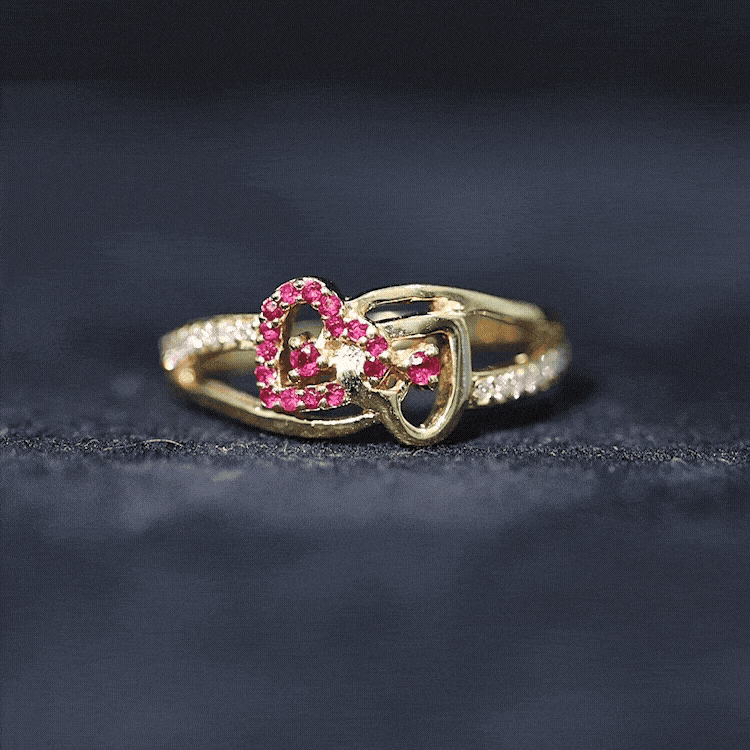 0.25 CT Interlock Heart Ring with Ruby and Moissanite in Gold