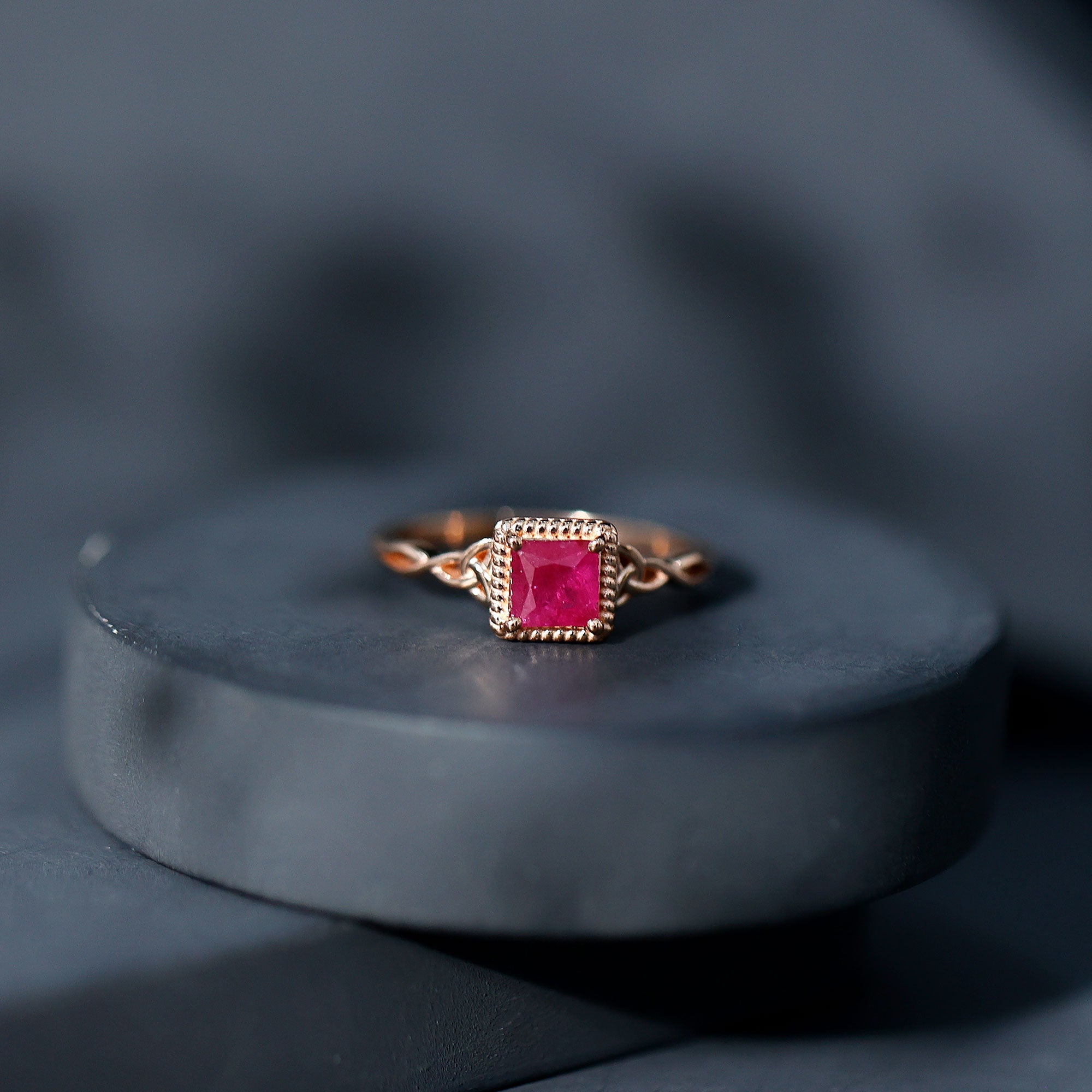 Princess Cut Ruby Solitaire Ring with Celtic Detail