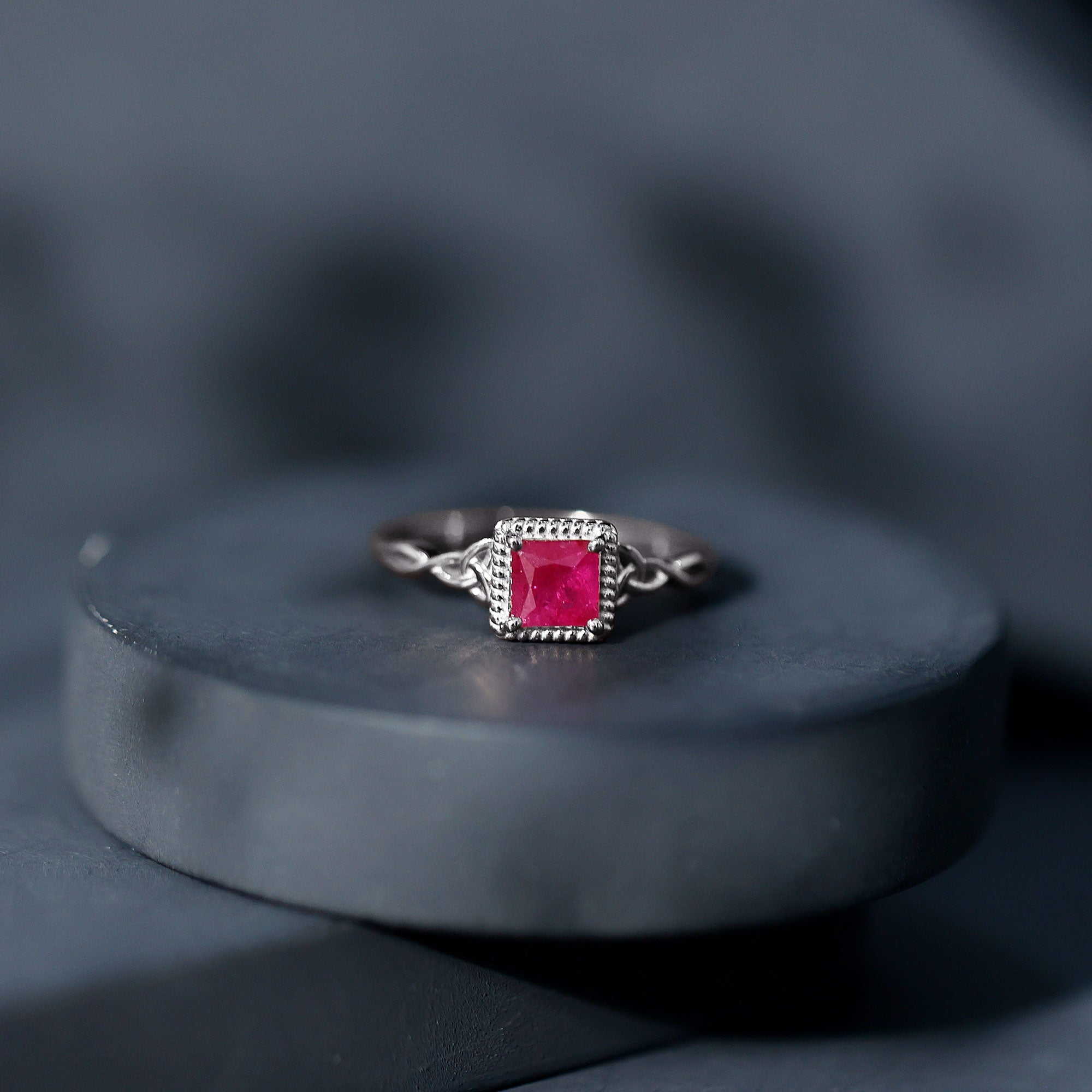 Princess Cut Ruby Solitaire Ring with Celtic Detail