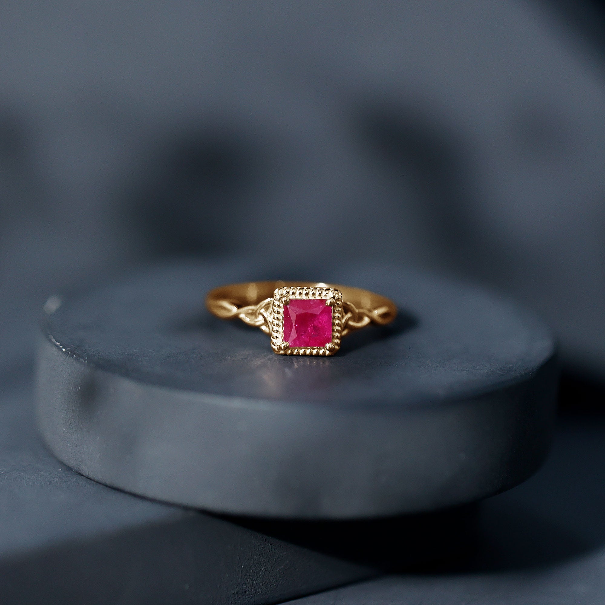 Princess Cut Ruby Solitaire Ring with Celtic Detail