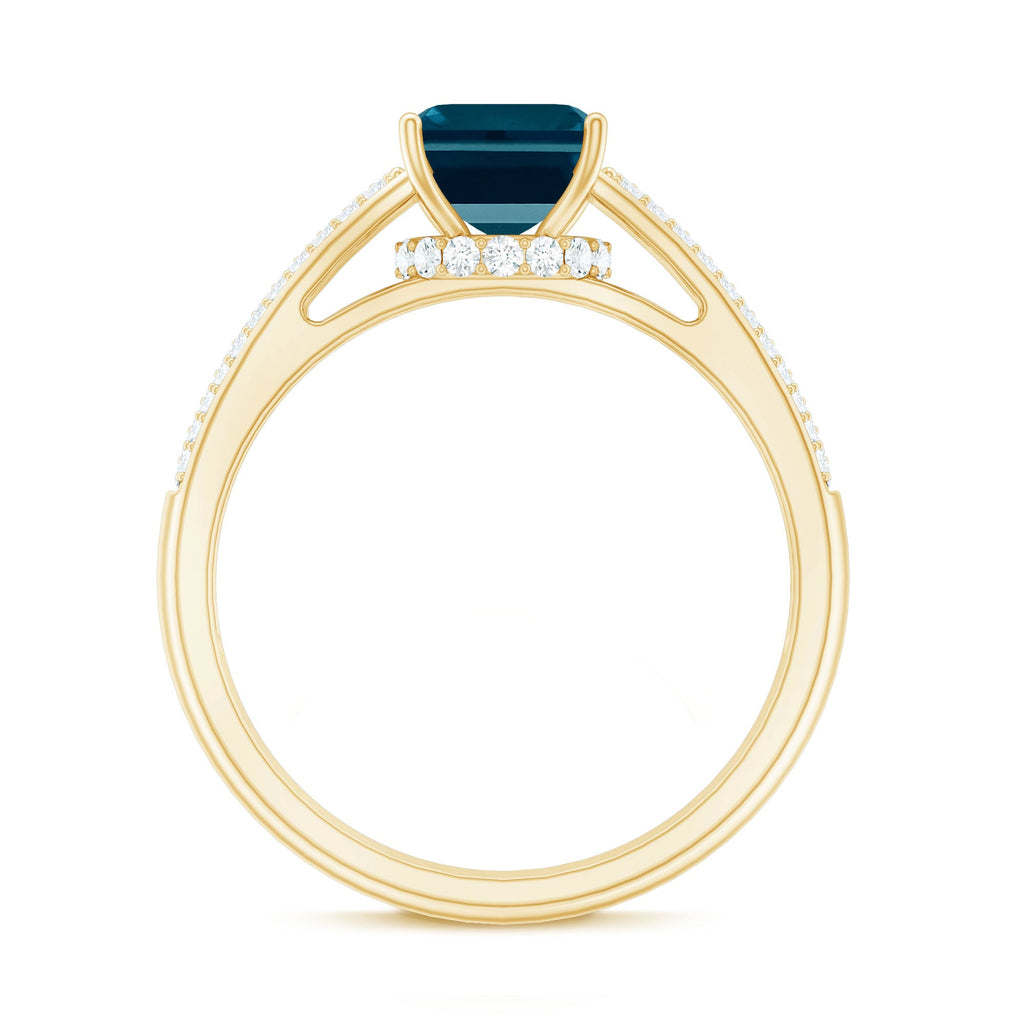 6X8mm Emerald Cut London Blue Topaz Side Stone Engagement Ring with Diamond