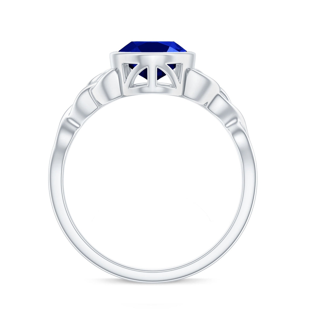Certified 4 Carat Oval Lab Grown Blue Sapphire Bezel Set Engagement Ring