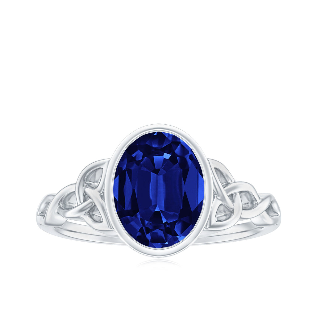 Certified 4 Carat Oval Lab Grown Blue Sapphire Bezel Set Engagement Ring