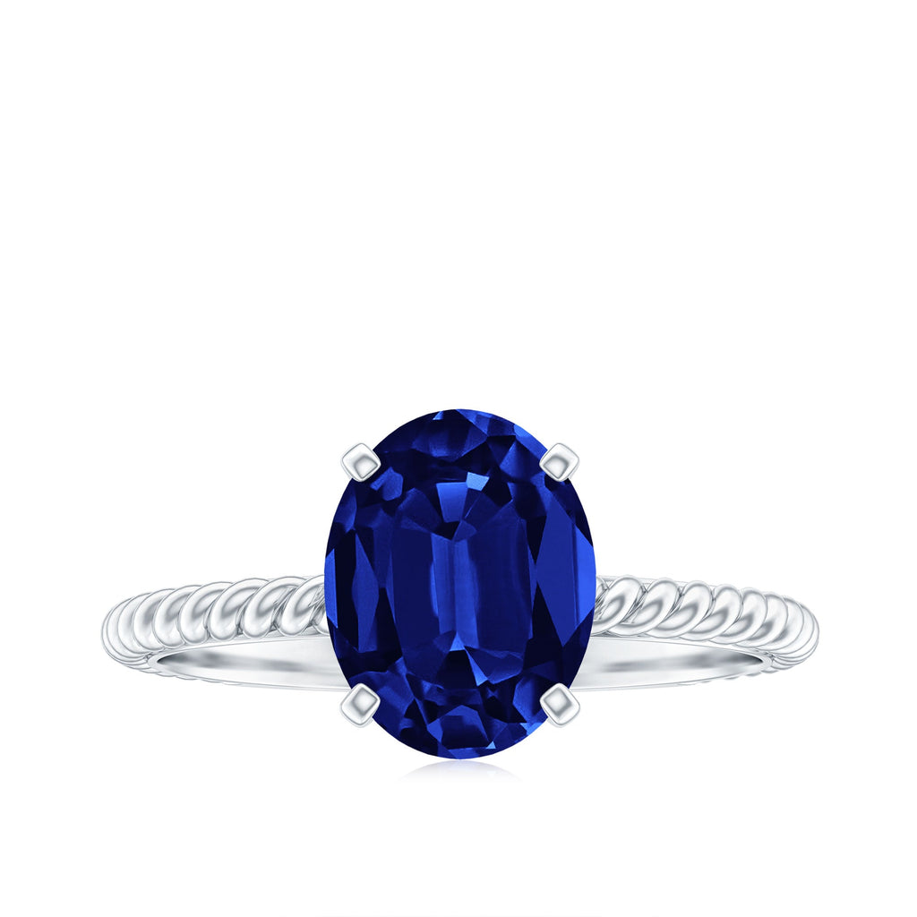 Certified 4 Carat Lab Grown Blue Sapphire Engagement Ring with Surprise Diamond