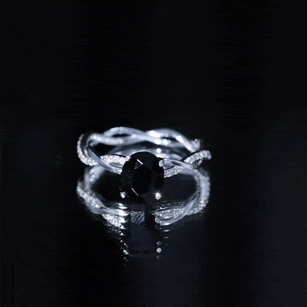 Oval Shaped 7X9MM Black Onyx and Diamond Braided Engagement Ring