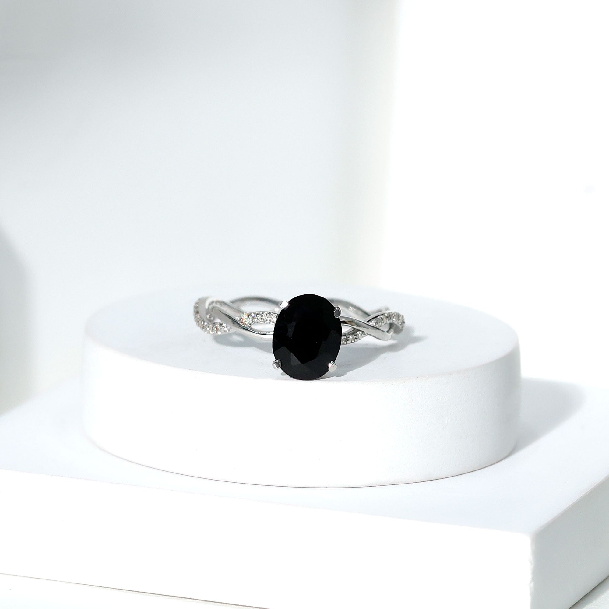 Oval Shaped 7X9MM Black Onyx and Diamond Braided Engagement Ring