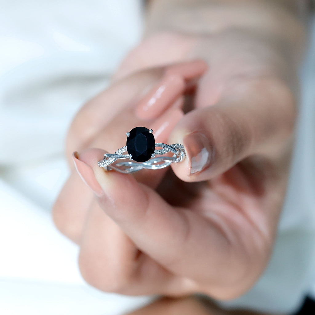 Oval Shaped 7X9MM Black Onyx and Diamond Braided Engagement Ring