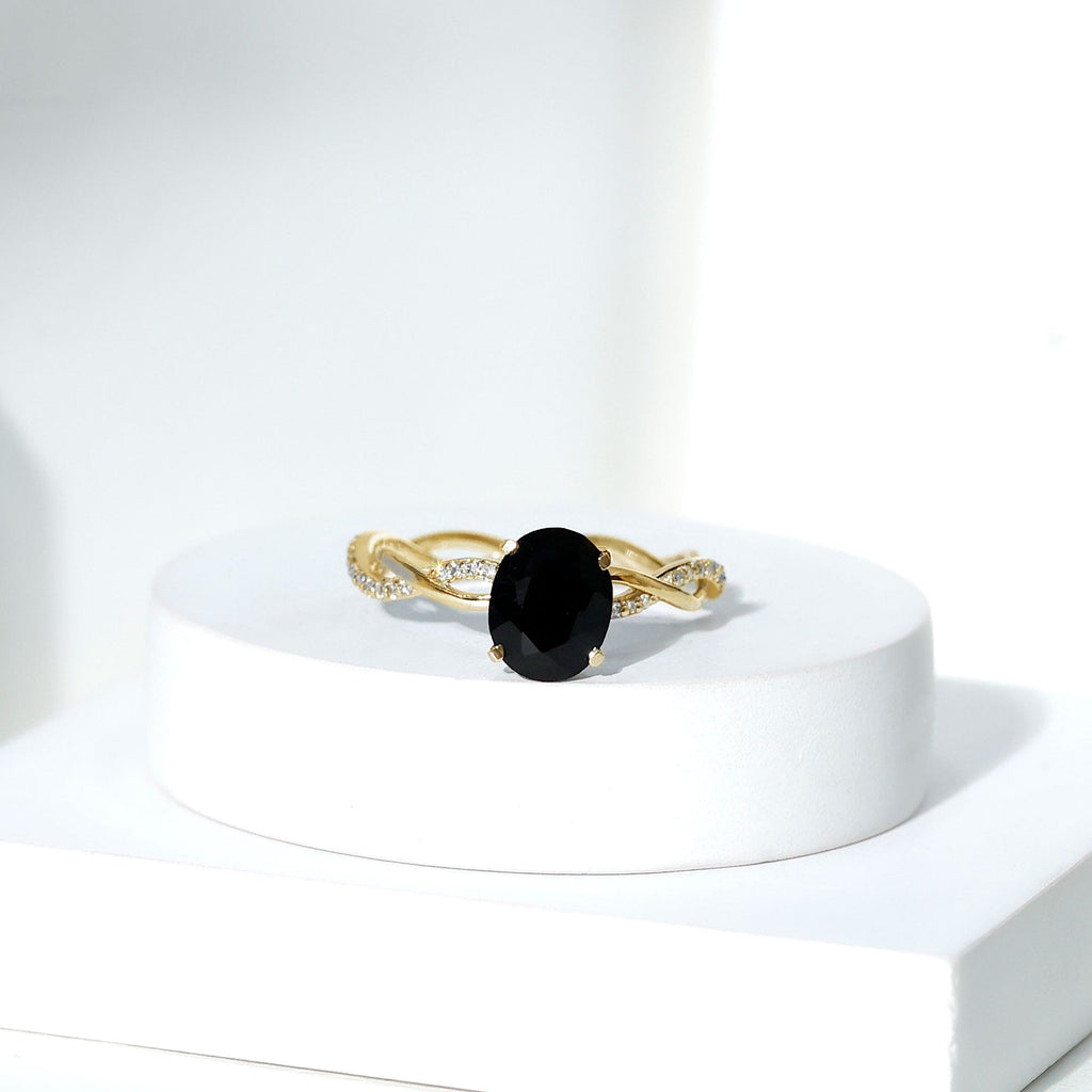 Oval Shaped 7X9MM Black Onyx and Diamond Braided Engagement Ring
