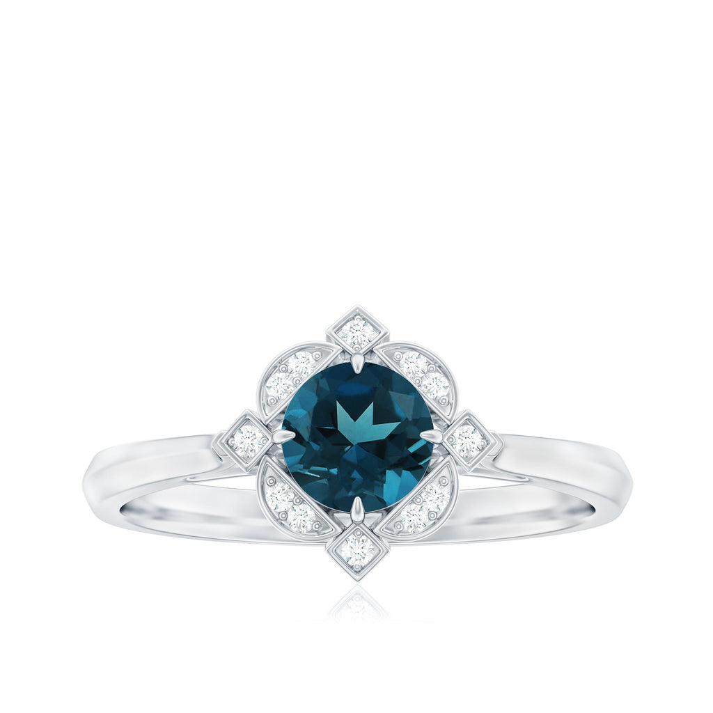 Round Cut London Blue Topaz and Diamond Flower Engagement Ring