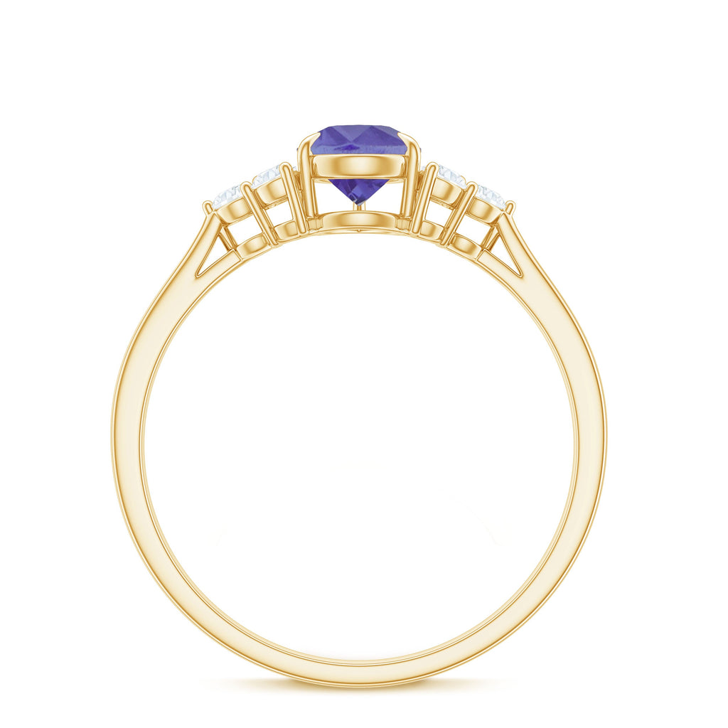 Pear Shaped Tanzanite Solitaire Ring with Diamond Trio