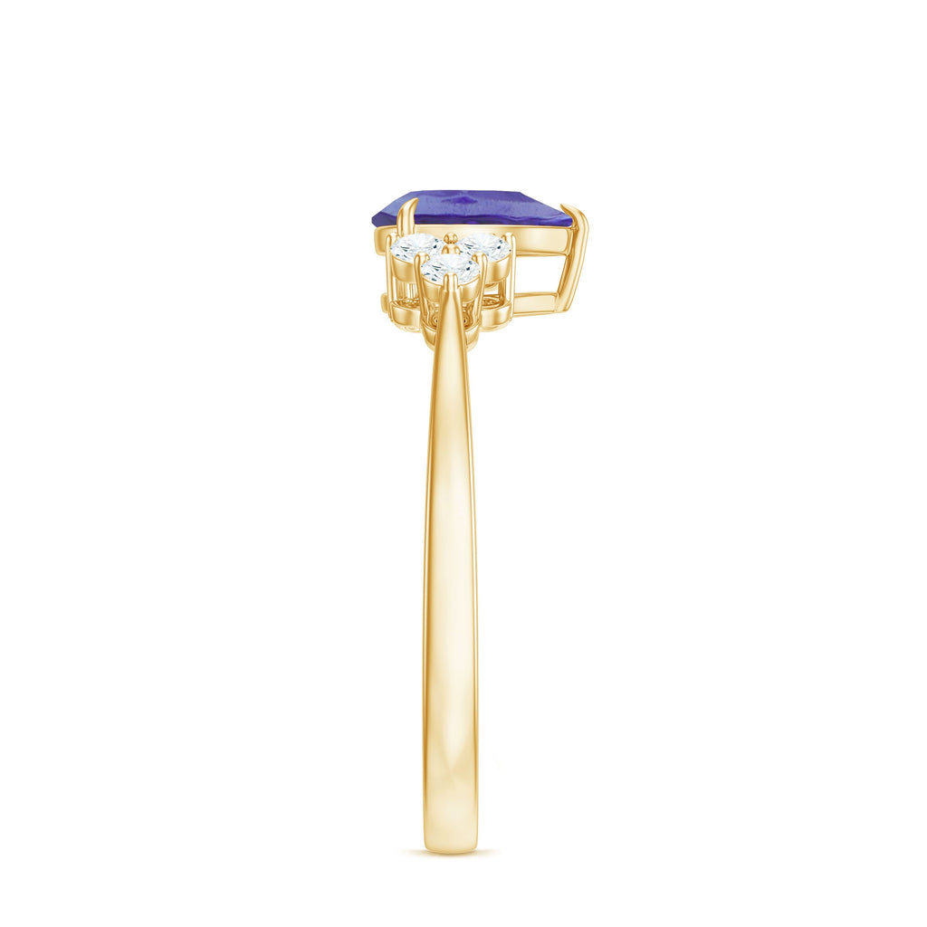 Pear Shaped Tanzanite Solitaire Ring with Diamond Trio
