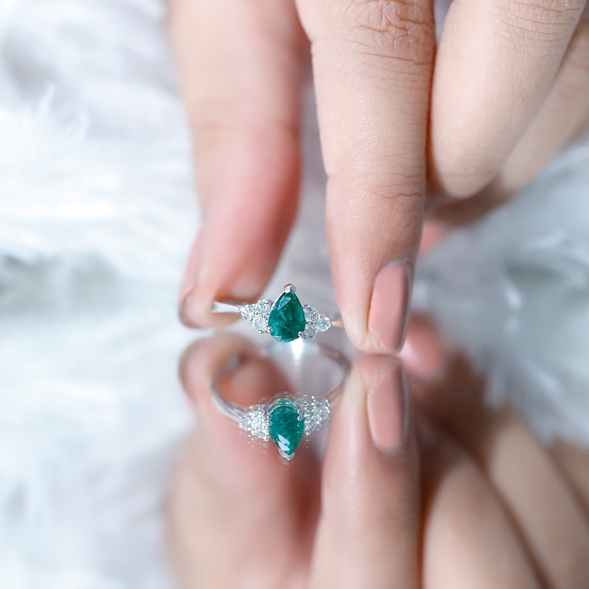 5X7mm AAA Quality Pear Shape Emerald Solitaire Engagement Ring with Diamond Trio