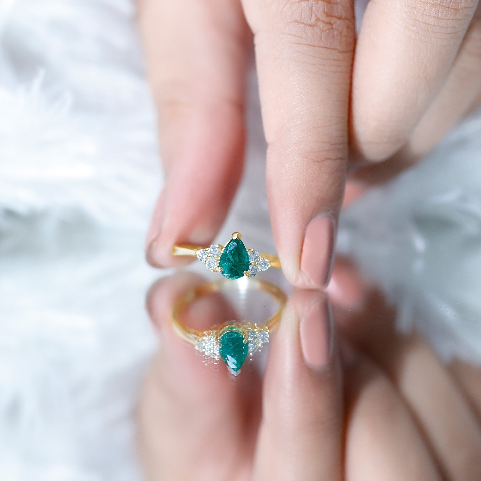 5X7mm AAA Quality Pear Shape Emerald Solitaire Engagement Ring with Diamond Trio