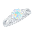Ethiopian Opal and Diamond Engagement Ring with Crossover Shank