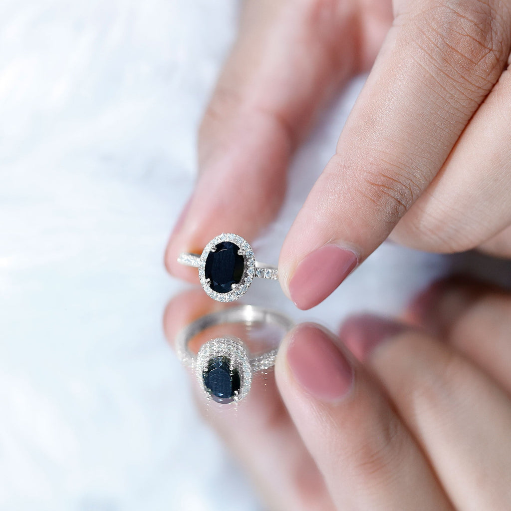6X8MM Oval Black Onyx and Diamond Halo Engagement Ring