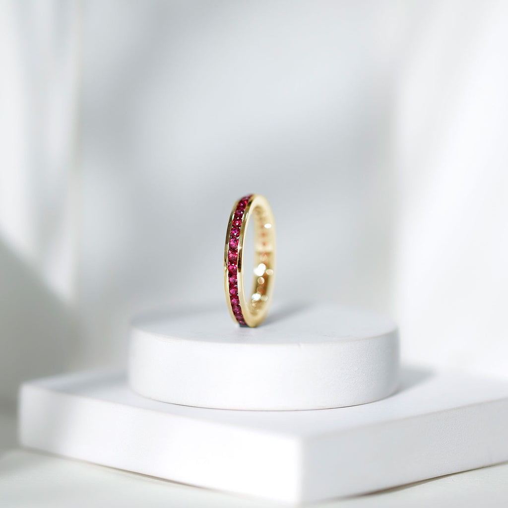Channel Set Round Created Ruby Eternity Band Ring