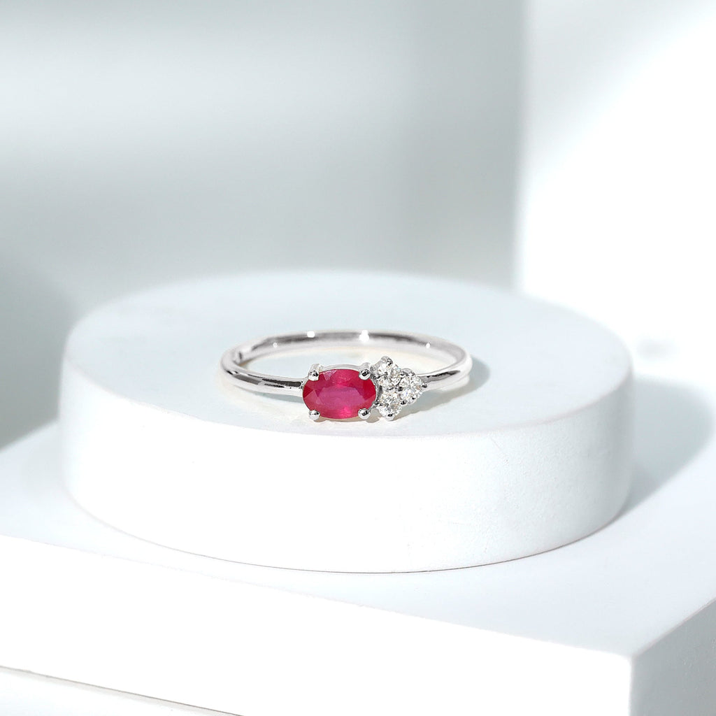 Oval Cut Ruby Promise Ring with Diamond Trio