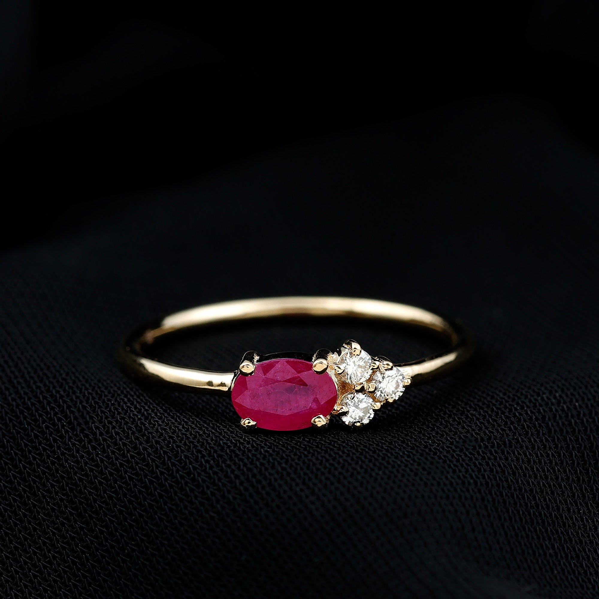 Oval Cut Ruby Promise Ring with Diamond Trio