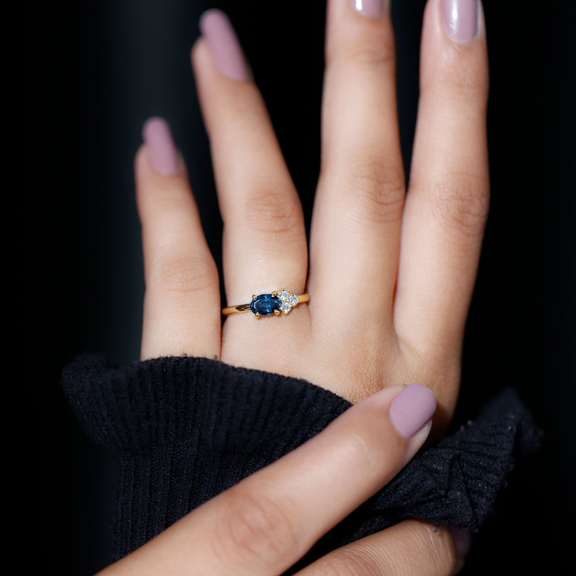 4X6mm Oval Cut London Blue Topaz East West Promise Ring with Diamond Trio